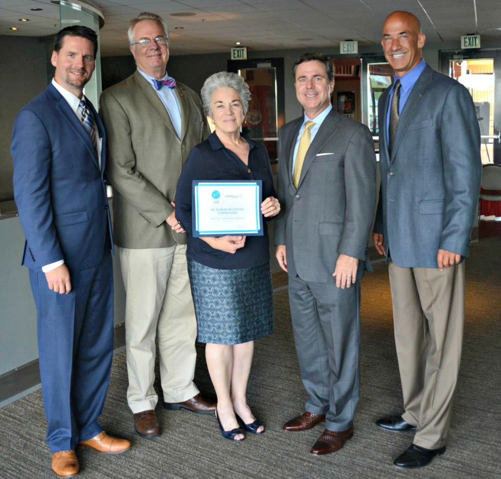 Left to Right: Aaron Teats (Vice President and Chief Marketing Officer, Anaheim Ducks), Rusty Kennedy (Executive Director, OC Human Relations), Susan Reese (Vice President, Board of OC Human Relations), Michael Colglazier (President, Disneyland Resort), Mark Merhab (Chairman, Angels Baseball Foundation)